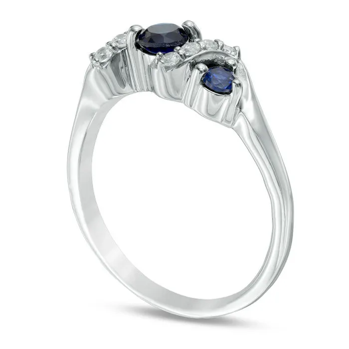 40mm LabCreated Blue Sapphire and 010 CT TW Diamond Overlay Three Stone Ring in Sterling Silver Goldia Rings 40mm LabCreated Blue Sapphire and 010 CT TW Diamond Overlay Three Stone Ring in Sterling Silver Goldia Rings