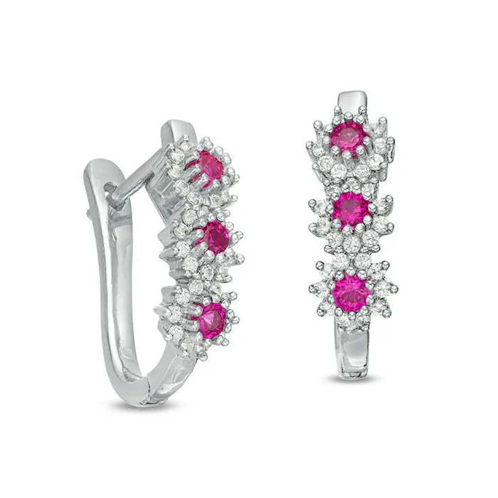 Goldia Earrings LabCreated Ruby and 02 CT TW Diamond Three Stone Sunburst Hoop Earrings in 10K White Gold Goldia Earrings LabCreated Ruby and 02 CT TW Diamond Three Stone Sunburst Hoop Earrings in 10K White Gold