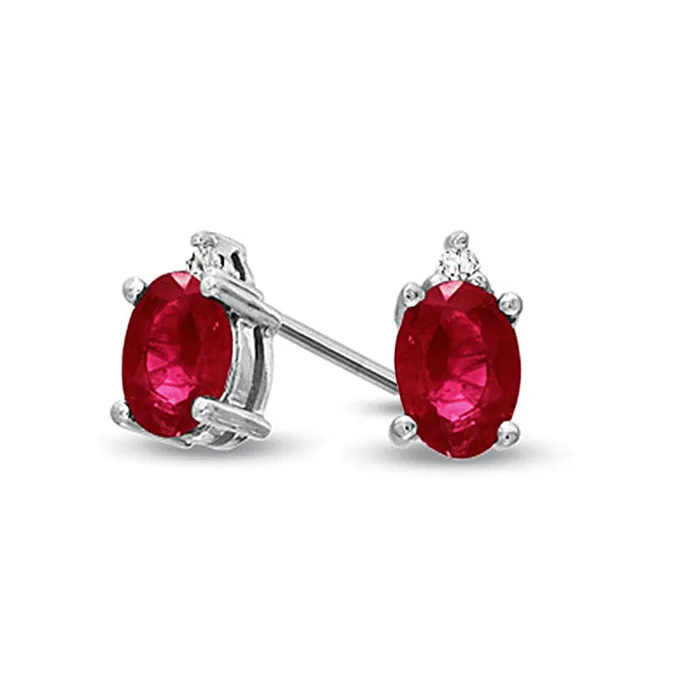 Goldia Earrings Oval Ruby and Diamond Accent Stud Earrings in 14K White Gold Goldia Earrings Oval Ruby and Diamond Accent Stud Earrings in 14K White Gold