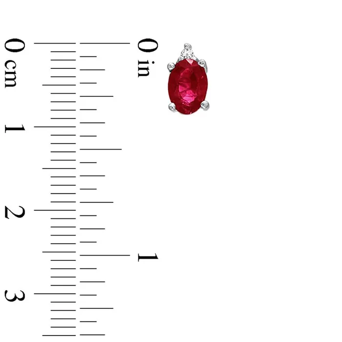 Goldia Earrings Oval Ruby and Diamond Accent Stud Earrings in 14K White Gold Goldia Earrings Oval Ruby and Diamond Accent Stud Earrings in 14K White Gold