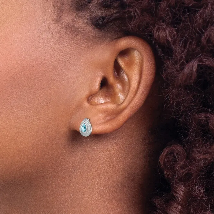 Goldia Earrings Sterling Silver Rhodium Light Swiss Blue Topaz and Diamond Post Earrings