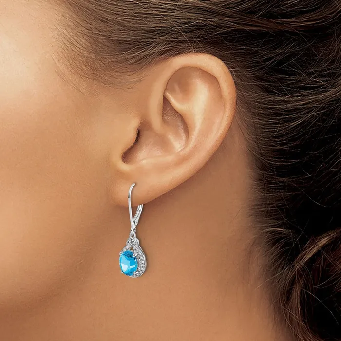 Goldia Earrings Sterling Silver Rhodiumplated Diamond and Blue Topaz Earrings