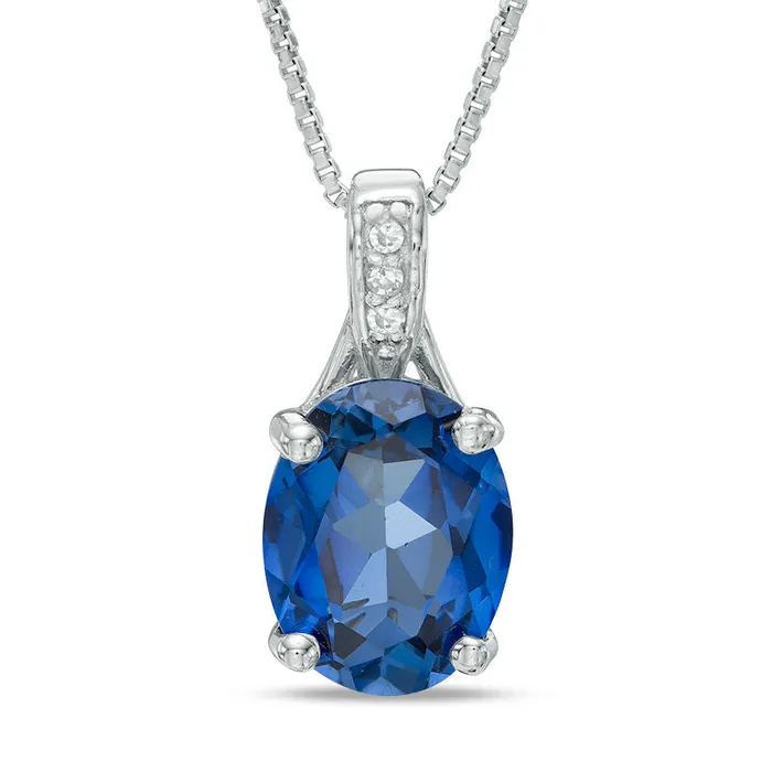 Oval LabCreated Blue Sapphire and Diamond Accent Pendant in Sterling Silver Goldia Necklaces Oval LabCreated Blue Sapphire and Diamond Accent Pendant in Sterling Silver Goldia Necklaces